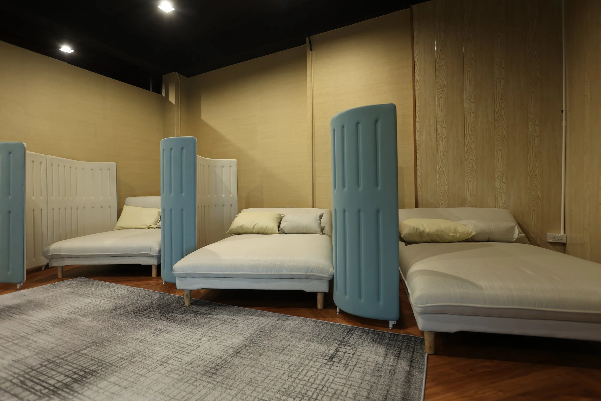 Rest lounge with screened day beds at Maxwell Onsen Bangkok gay onsen
